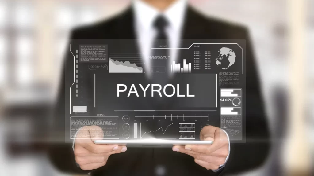 payroll-integration-hovering-over-laptop