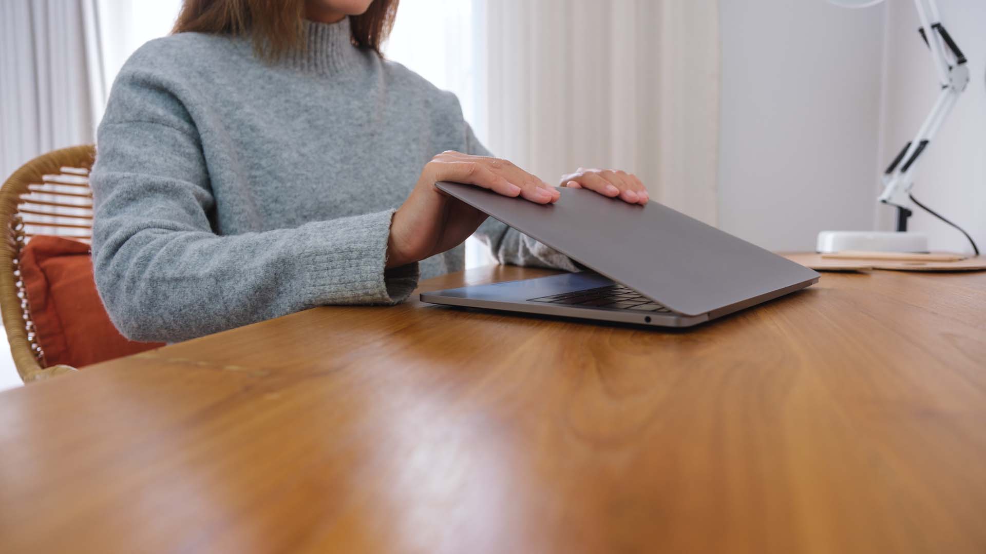closeup-image-of-hands-close-and-open-a-laptop-computer.jpg
